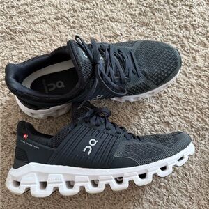 On Running Charcoal and White Athletic Shoes